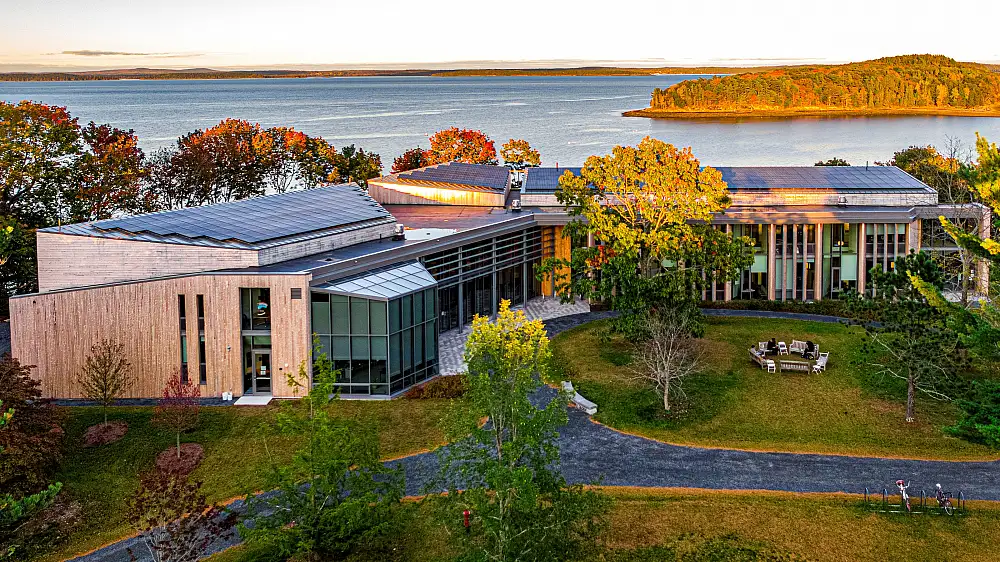 Wide shot of the COA Davis Center at sunset